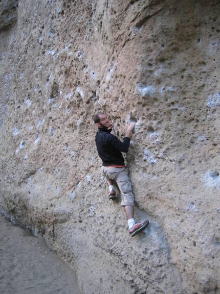 bouldering the 5.10ish start of Monkey Sang, Monkey Do on the Planet of the Apes Wall at Malibu Creek State Park.
