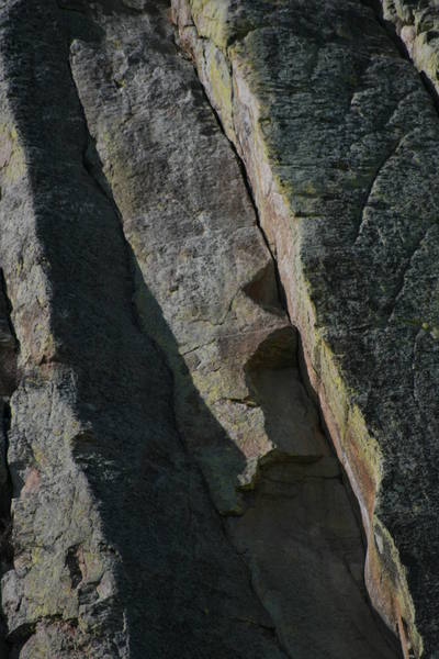 This BEAUTIFUL route pulls through a series of roofs.  One crack right is "Gooseberry Jam"... and one crack left (in the shadow) is "Casper College".