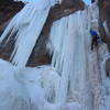 Chris Sheridan stepping out of the frying pan and into the fire on the first pitch of the Redstone Slabs.  Photo taken 3/3/07.