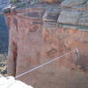 The outstanding tyrolean traverse between Grand View Spire and the rim.