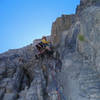 The crux second pitch of Book of Saturday, Notch Peak.