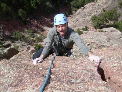 Face climbing around the crack.
