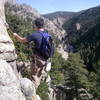 Robbie on top belay duties before our 4th class scramble to Bihedral