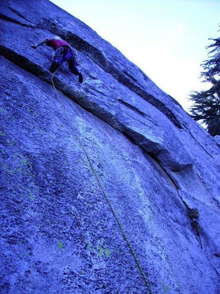 Nearing the first bolt on Superfluous Bolt.  The climb then follows the left facing flake in the very upper left corner of the photo.