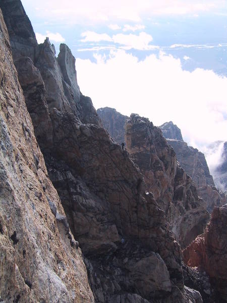 A party climbing the Petzoldt Ridge, as viwed from the Exum.  This group was led by Doug Coombs who we later met near the summit and talked to on the descent.  Photo taken September 2003.