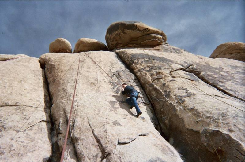 One of my fiancee's (girlfriend then) first climbs. Dancing up B-1 with a smile on her face.