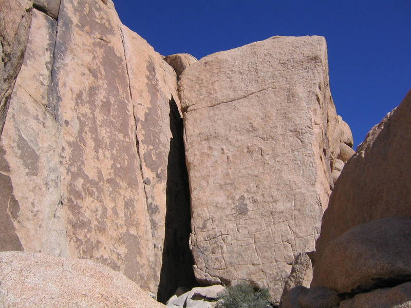 An up close view of the cliff to look for.  White Rabbit is in the middle of the face to the right; Alice in Wonderjam is the wider of the two cracks on the left wall.