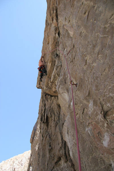 Mike shakes out before the crux of Thieves in the Temple, 5.12a