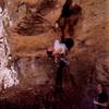 Tony leads the OW roof of 'Orangahang, (5.11c)' in Springfield Gorge, OH. Mike Heffner Belays. Photo by Mindy Huddleston, ~1994.