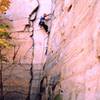 Tony Bubb leads "Rock Wars (5.9+)" on Long Wall, in the Red River Gorge, KY. Photo by Casey Rhodes, 1991