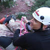 Dave Champion belaying Robin up the Great Zot - Photo by Todd Felix (I think). I'm in the little yellow helmet getting ready for the blastoff.