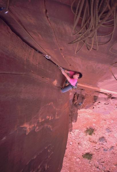 Tony Bubb follows the unnamed 5.11+ corner on the Fin Wall at Indian Creek. Photo by Joseffa Meir, 2/06.