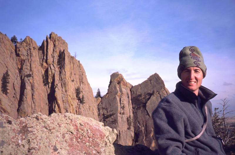 Brian Weiss enjoys the view of Redgarden from the top of Long John Tower on Eldo's West Ridge. Photo by Tony Bubb, January, 2001.