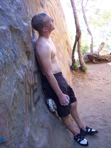 Contemplating the v3 boulder problem behind Beethoven's Wall. It's up there just really far....