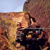 Tony Bubb starts up the steep but short and mellow final pitch of Wanderlust (5.7) on the Veil, in Eldo. Photo by John Saccardi, 2002.