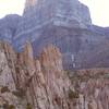 Notch Peak rises above the pink granite of Sawtooth Canyon.