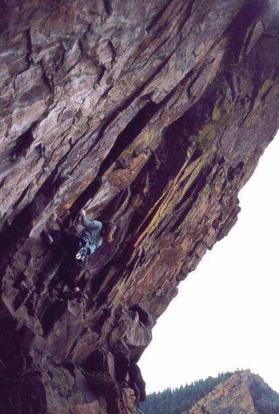 Diane Connelly gets started on the steep and pumpy 'Wingshot (5.11)' in the amphitheatre of the West Ridge. Photo by Tony Bubb, 2002