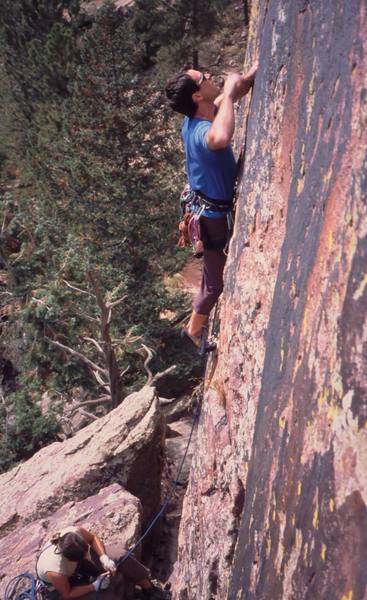 Tony Bubb geting started on the thin and gymanstic 'Thunderbolts From Hell (5.12)' on Eldo's West Ridge. Photo from Joseffa Meir, 2003.