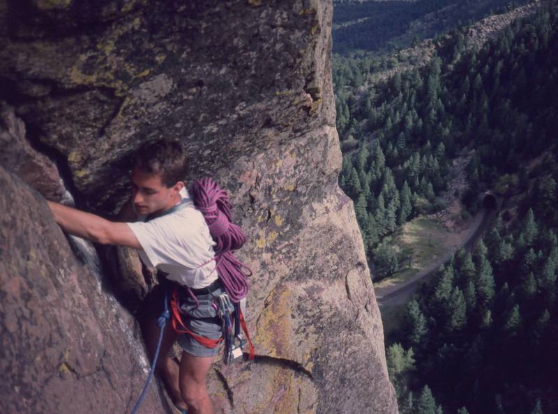 John Cioci finishes up on what must be one of the best pitches of 5.7 in Boulder County- Green Dihedral, at Micky Mouse Wall. Don't forget your second rope, to rap down. Photo by Tony Bubb, 1999.