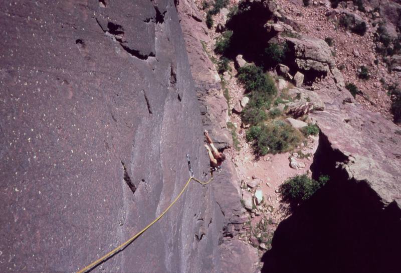 Josh Janes approaches the steep section on 'Night (5.11)' on Eldo's Redgarden Wall. Photo by Tony Bubb in 2004.