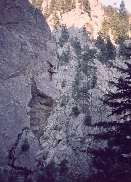 Tony Bubb on the steep arete after the crux section on 'Lucid Dreaming (5.13-)' on Polotinus Wall. Chris Parks belays. Photo by Peter Spindloe, 2003.