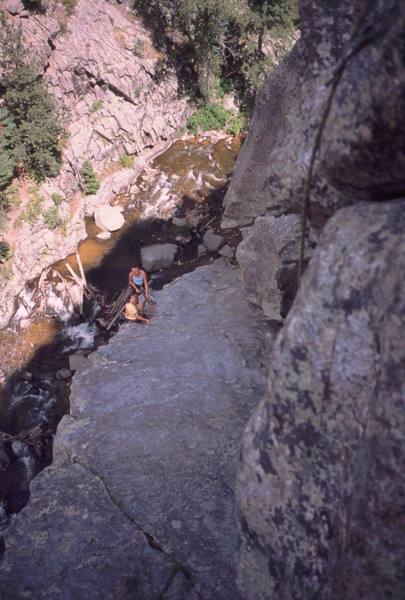 Joseffa Meir and Kre Reischel are at the belay at the top of P1 on 'Hunky Monkey (5.11a)' on Lost Angel in Boulder's Dream Canyon. Photo taken from mid-pitch on P2 by Tony Bubb, 2005.