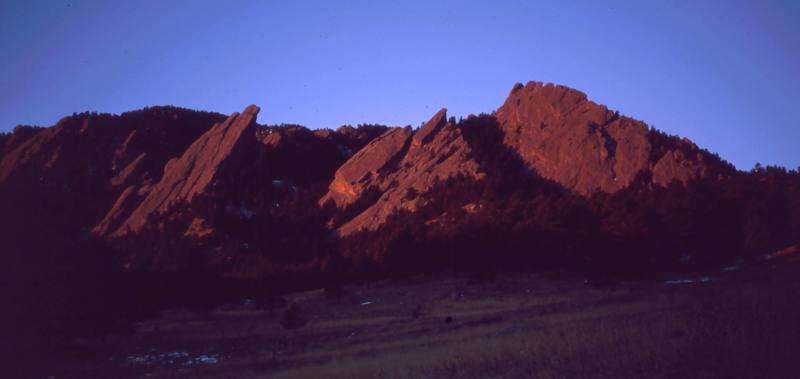 The Flatirons can catch awesome light by morning. Make sure to take at least one sunrise hike there if you visit. Photo by Tony Bubb, 1997.