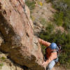 David Hoffberg climbs the very unusual, 90-foot tall, knife-blade arete on the first pitch of Free to Choose.