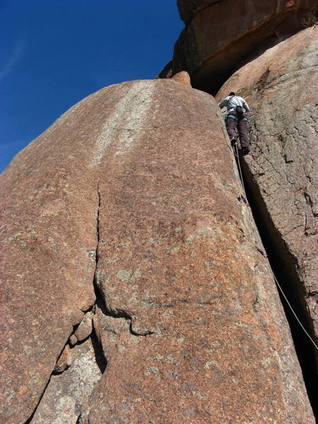 Chicken Legs is the crack-to-bulgy-slab route left of Reptillian Wall (with climber).  Left and Right variations are possible on the slab.  The right appears slightly harder than the left.