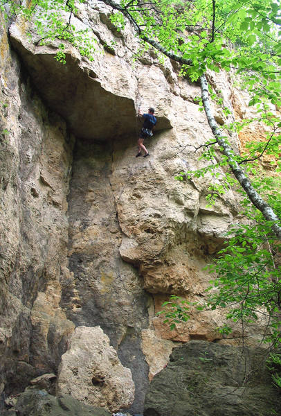 Holger Gassner pulling the crux roof on Talking with God. Summer, 2005.