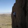 Giovanni struggling up the steep crack.