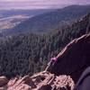 Tony Bubb wanders around looking for protection on the way up to the summit of 'Like Heaven' to find the rap after climbing 'Better Than Love' on the West side of Skunk Canyon's Ridge One.<br>
<br>
Photo by Patty, 2006.