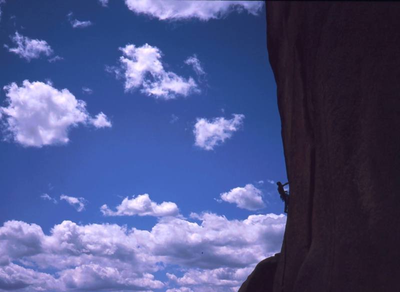 Tony Bubb starts up the fingers section of the 'Bishop Crack' on The Bishop formation in the South Platte.<br>
<br>
Photo by Dave Stewart or maybe Mike Bannister, 2005. 