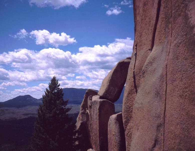 Tony Bubb half way burried in the awkward and wide start of the 'Bishop Crack' in the South Platte.<br>
<br>
Photo by Dave Stewart or maybe Mike Bannister, 2005. 