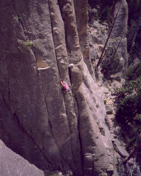 Topher Donahue works his way up 'Road Kill' (5.10) on The Book, at Lumpy Ridge. Photo by Tony Bubb, 2005.