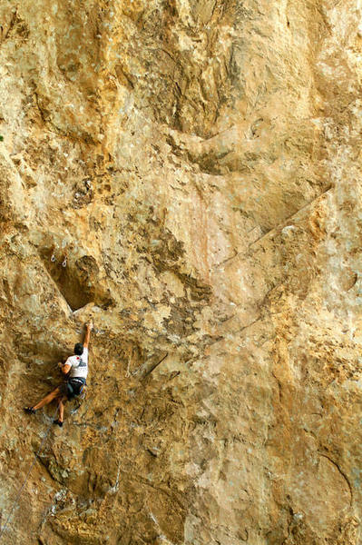 Jay on Conny Loves Daddy, 12a. Climbing at Charleston in his ratty JTree shirt- why must you try me? ;) Photo by me. June 06.