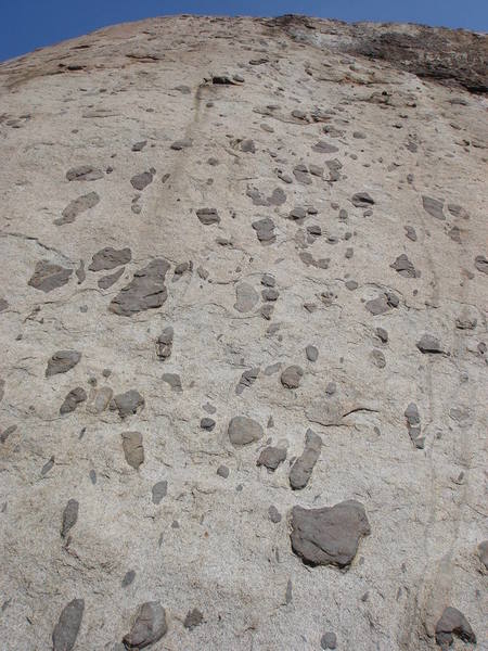 Follows the bolt line through the spots.  The first anchor is hidden; it lies just left of the upper brown area (Sierra Club Route) on a sloping shelf.  The second pitch starts up and left from there and finishes well above the anchors for the central routes to the left.