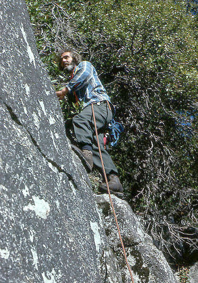 The late Warren Harding climbing difficult class 4.<br>
Photo by Blitzo.