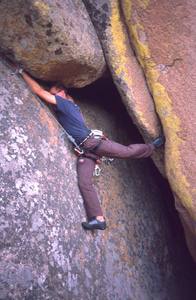Chris Parks follows the more strenuous and exposed finish to Satterfield's Crack (5.9?). Photo by Tony Bubb, 2004.