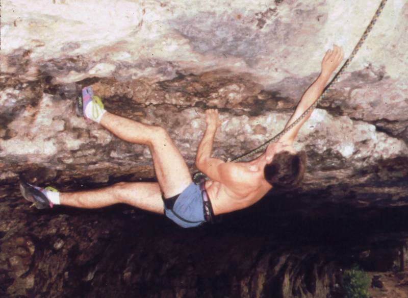 Tony Bubb on the TR problem "Devine Intervention (12c)" in Springfield Gorge, OH. These shorts are in competion with Hank's "Mandukes" for the fasion disaster award. Photo by Casey Rhodes ~ 1991.