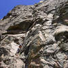 Tamara approaching the p5 roof.  The climbs crux, which is quickly followed by a short section of nasty offwidth.  Just to the left of the roof is the belay for Warpy Moople's p5.  