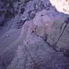 Tony B. coming up just past the crux on Carol's Crack(11a). Photo by Joseffa Meir, 7/2001.