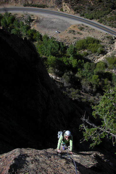 Marisa Fienup approaches the summit atop "Capitalism & Freedom"