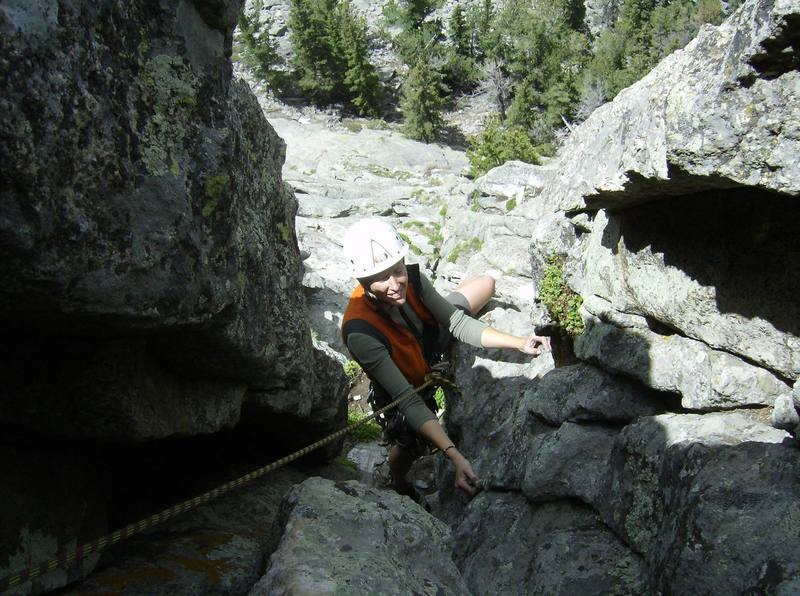 Tracy coming up to the belay just below the roof.