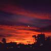 If you are climbing at Mt Lemon, you will probably be saying in Tucson. This will be your evening view, even from downtown.<br>
Sunset on Grant Street. Photo by Tony Bubb, 12/24/01.