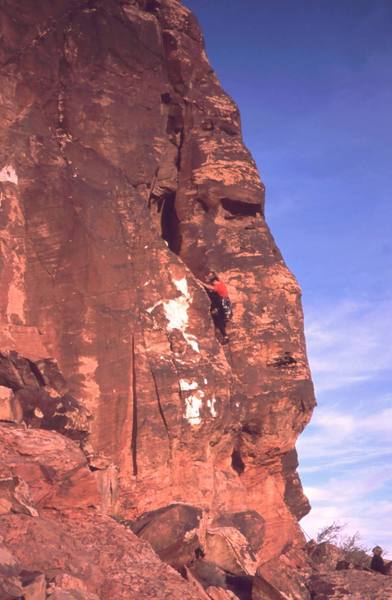 Tony Bubb starts up 'Pending Disaster' (5.9+) at Red Rocks' Moderate Mecca. Photo 1/03. By Kent Korbel?