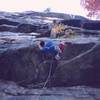 Tony Bubb hears the punch-line on 'Laughing Man' (11b, PG-13). A was told this was 5.10a... Photo by Michelle Moffat, 10/03. 