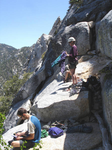 Kim, and Brett gearing up.<br>
<br>
Jonny looking over beta printed out from Mountain Project on some classic routes in the vicinity.<br>
<br>
Taken 6/13/07