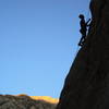 Tai Devore ("Mr. Pine Creek") doing the first climb (11b) as you come into the canyon. 