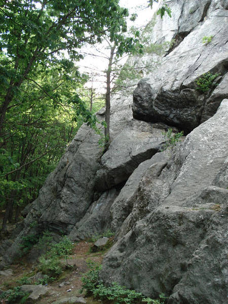 The left end of the cliff.... the big black overhang in the upper right is none other than "The Black Overhang"